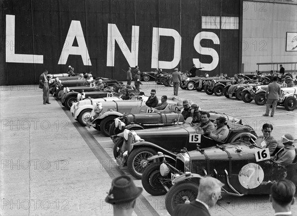 Cars on the start line at the MCC Members Meeting, Brooklands, 10 September 1938. Artist: Bill Brunell.