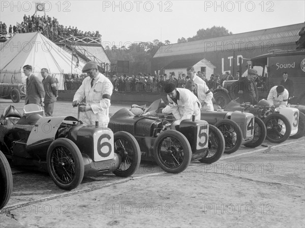 Austin 747 cc works racers of C Goodacre and JD Barnes, BRDC 500 Miles Race, Brooklands, 1931. Artist: Bill Brunell.