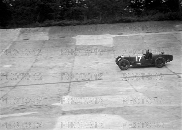 Early production body Riley 9 Brooklands with doors racing at a JCC Members Day, Brooklands. Artist: Bill Brunell.