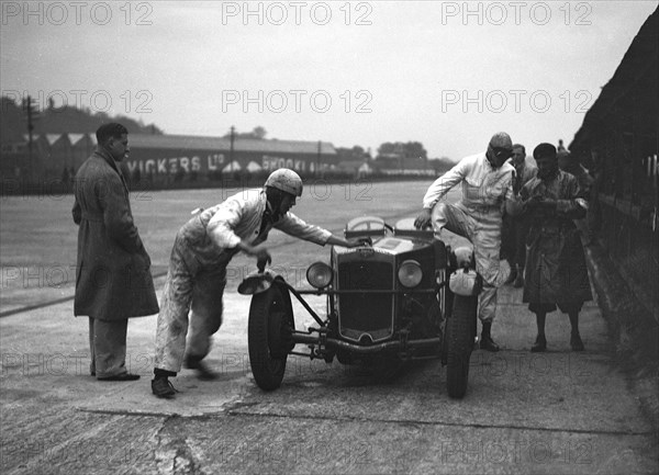 RL Bellamy's Frazer-Nash in the pits at a JCC Members Day, Brooklands. Artist: Bill Brunell.