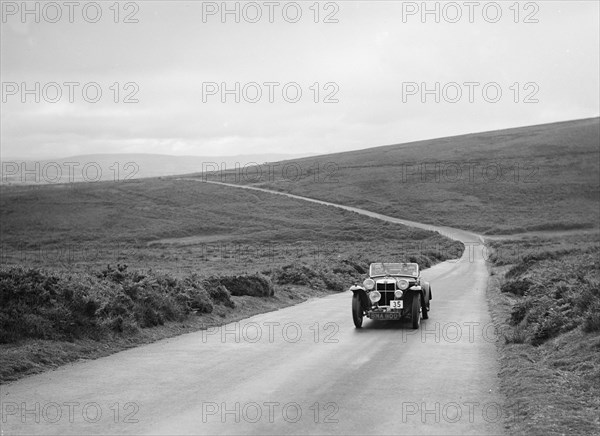 MG PA of R Bayles, winner of a bronze award at the MCC Torquay Rally, July 1937. Artist: Bill Brunell.