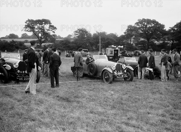 Two Bugatti Type 44s taking part in the Bugatti Owners Club gymkhana, 5 July 1931. Artist: Bill Brunell.