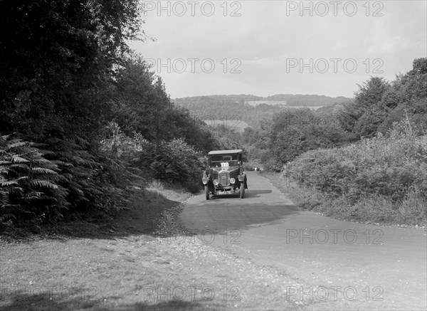 Singer Junior taking part in a First Aid Nursing Yeomanry trial or rally, 1931. Artist: Bill Brunell.