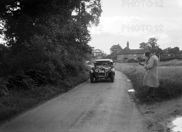 Alfa Romeo taking part in a First Aid Nursing Yeomanry trial or rally, 1931. Artist: Bill Brunell.