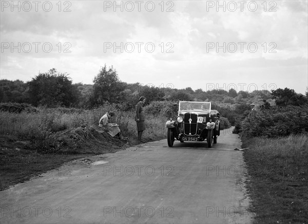 Austin 12/4 taking part in a First Aid Nursing Yeomanry trial or rally, 1931. Artist: Bill Brunell.