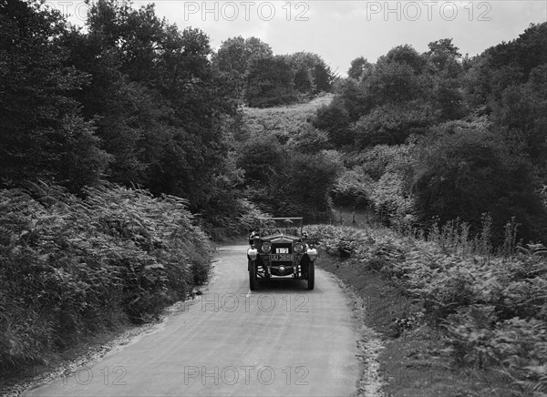 Car taking part in a First Aid Nursing Yeomanry trial or rally, 1931. Artist: Bill Brunell.