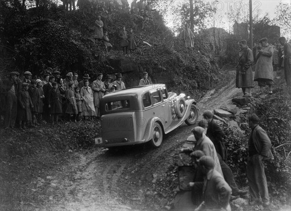 1934 Standard Sixteen taking part in a Standard Car Owners Club trial. Artist: Bill Brunell.