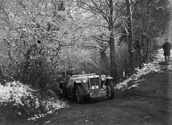 1936 MG TA taking part in a motoring trial, late 1930s. Artist: Bill Brunell.