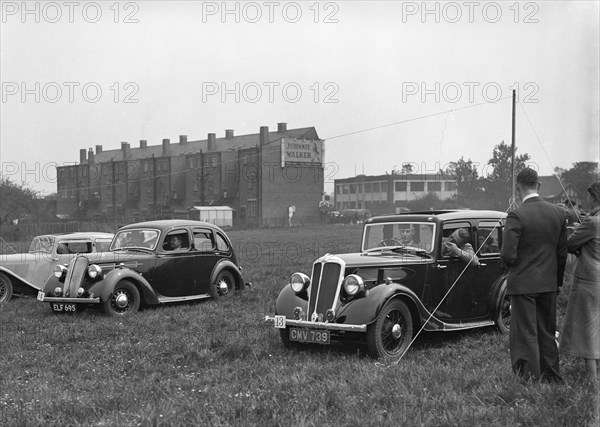 Standard SS I, Flying Twelve and Twelve at the Standard Car Owners Club Gymkhana, 8 May 1938. Artist: Bill Brunell.