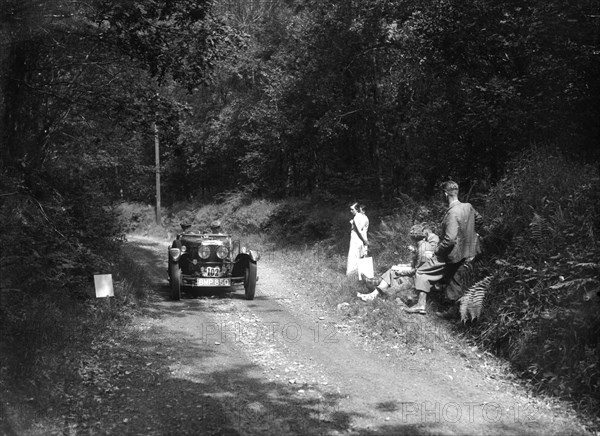 1935 Frazer-Nash TT replica taking part in a motoring trial, late 1930s. Artist: Bill Brunell.