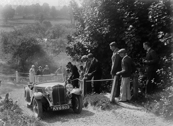 Triumph 2-seater taking part in a West Hants Light Car Club Trial, Ibberton Hill, Dorset, 1930s. Artist: Bill Brunell.