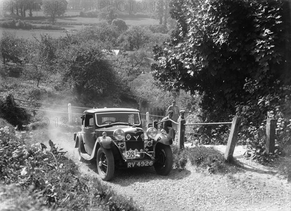 1934 Riley Kestrel taking part in a West Hants Light Car Club Trial, Ibberton Hill, Dorset, 1930s. Artist: Bill Brunell.