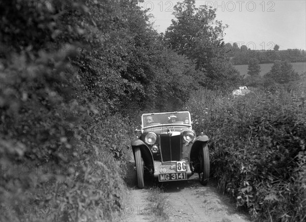 MG PA taking part in the B&HMC Brighton-Beer Trial, 1934. Artist: Bill Brunell.