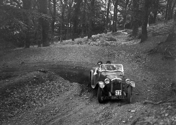 Austin 7 with Arrow body, B&HMC Brighton-Beer Trial, Fingle Bridge Hill, Devon, 1934. Artist: Bill Brunell.