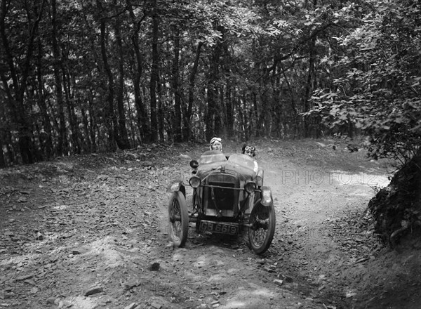 Anzani GN Special of Barbara Marshall, B&HMC Brighton-Beer Trial, Fingle Bridge Hill, Devon, 1934. Artist: Bill Brunell.