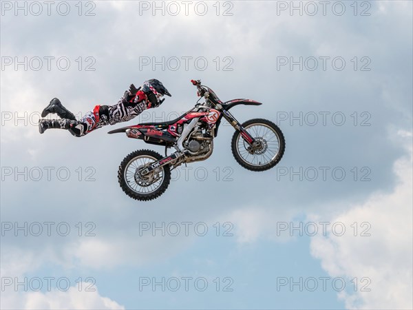 Freestyle Moto-Cross stunt motorcycling 2013 Artist: Unknown.