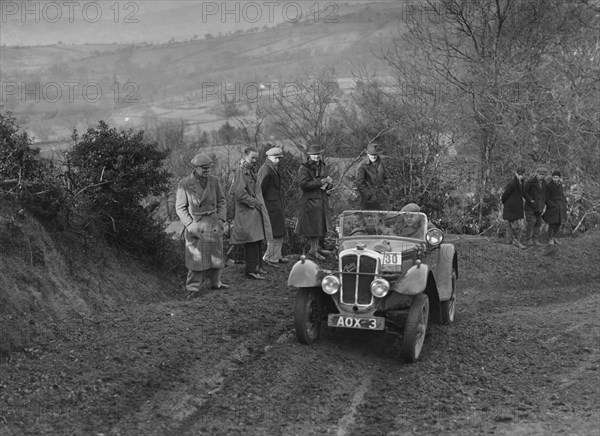 Austin 7 Grasshopper of TH Cole competing in the MG Car Club Midland Centre Trial, 1938. Artist: Bill Brunell.