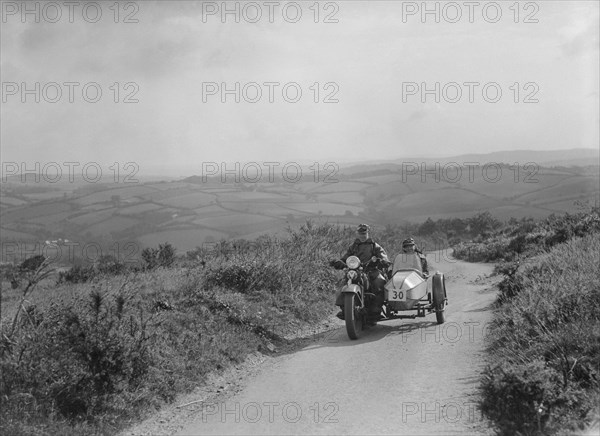 Harley-Davidson and sidecar of RW Praill competing in the MCC Torquay Rally, 1938. Artist: Bill Brunell.