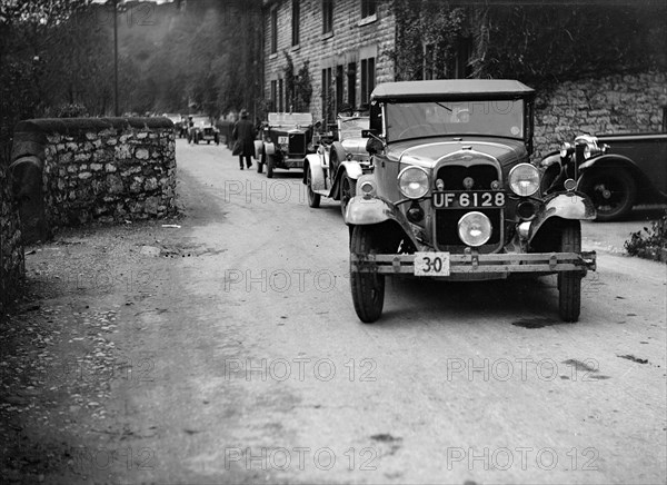 Ford Model A of EAL Midgely and Morris Cowley at the MCC Sporting Trial, 1930. Artist: Bill Brunell.