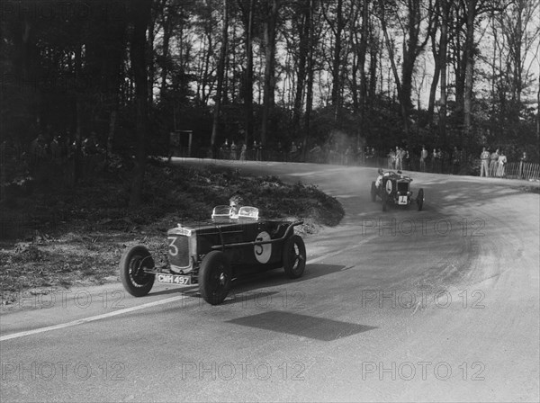 Two Frazer-Nash cars racing at Donington Park, Leicestershire, 1930s. Artist: Bill Brunell.