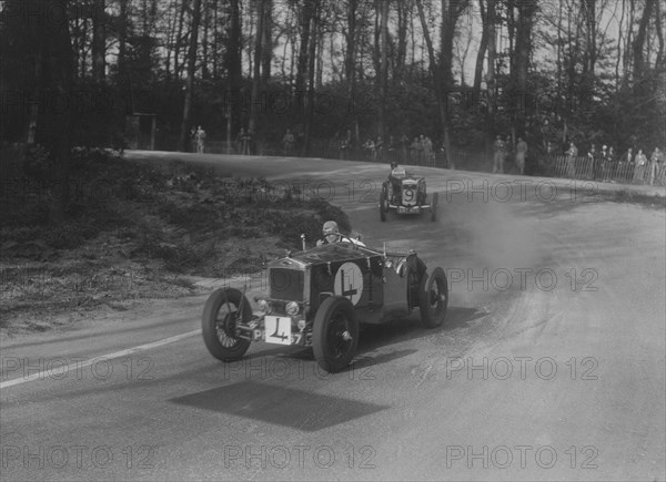 Two Frazer-Nash cars racing at Donington Park, Leicestershire, 1930s. Artist: Bill Brunell.