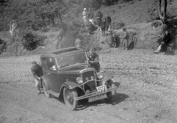 Austin 10 saloon at the Mid Surrey AC Barnstaple Trial, Beggars Roost, Devon, 1934. Artist: Bill Brunell.