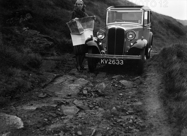 Kitty Brunell road testing a Standard Little Twelve saloon, c1932. Artist: Bill Brunell.