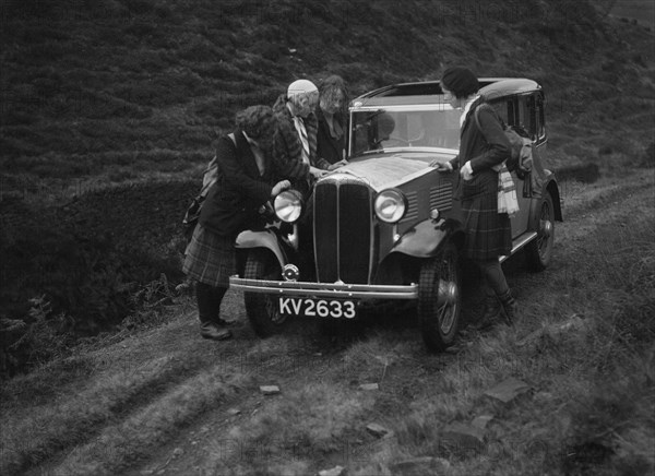 Kitty Brunell road testing a Standard Little Twelve saloon, c1932. Artist: Bill Brunell.