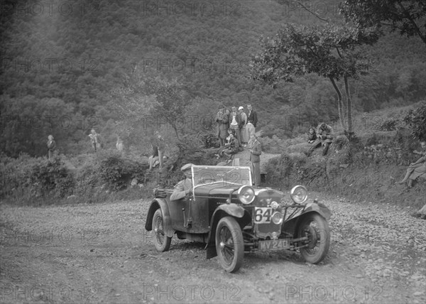 Frazer-Nash competing in the Mid Surrey AC Barnstaple Trial, Beggars Roost, Devon, 1934. Artist: Bill Brunell.