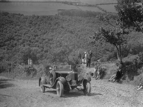 Alfa Romeo RL competing in the Mid Surrey AC Barnstaple Trial, Beggars Roost, Devon, 1934. Artist: Bill Brunell.