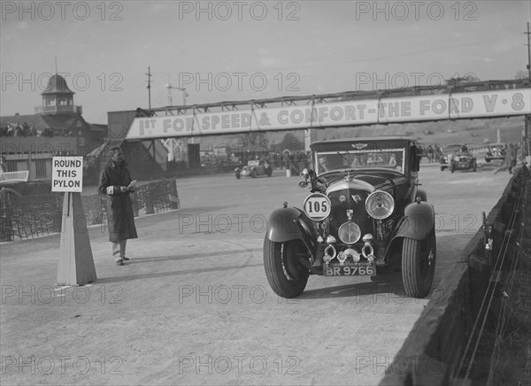 6.5 litre Bentley saloon competing in the JCC Rally, Brooklands, Surrey, 1939. Artist: Bill Brunell.