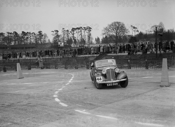 Talbot saloon competing in the JCC Rally, Brooklands, Surrey, 1939. Artist: Bill Brunell.