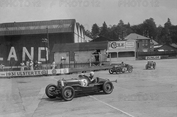 Aston Martin, Austin Ulster TT car and Austin 7, BARC meeting, Brooklands, Surrey, 1933. Artist: Bill Brunell.