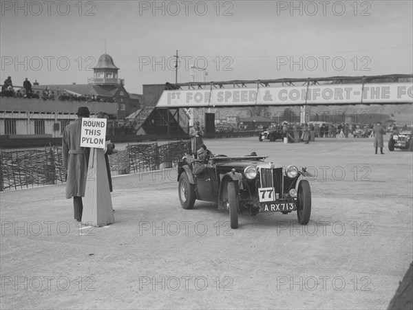 MG TA competing in the JCC Rally, Brooklands, Surrey, 1939. Artist: Bill Brunell.