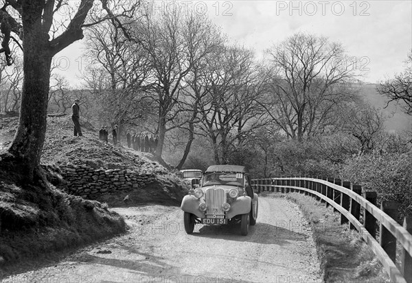 Kay Petre's Singer Nine competing in the RAC Rally, 1939. Artist: Bill Brunell.