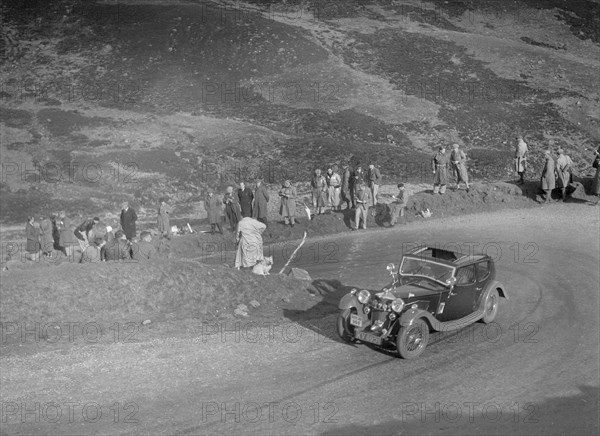 Riley Falcon or 4-light Kestrel of GCS Turner, RSAC Scottish Rally, Devil's Elbow, Glenshee, 1934. Artist: Bill Brunell.