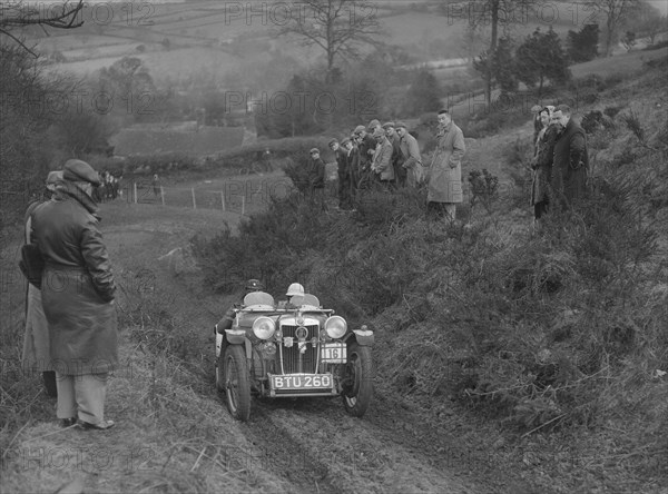 MG PB of J Terras competing in the MG Car Club Midland Centre Trial, 1938. Artist: Bill Brunell.