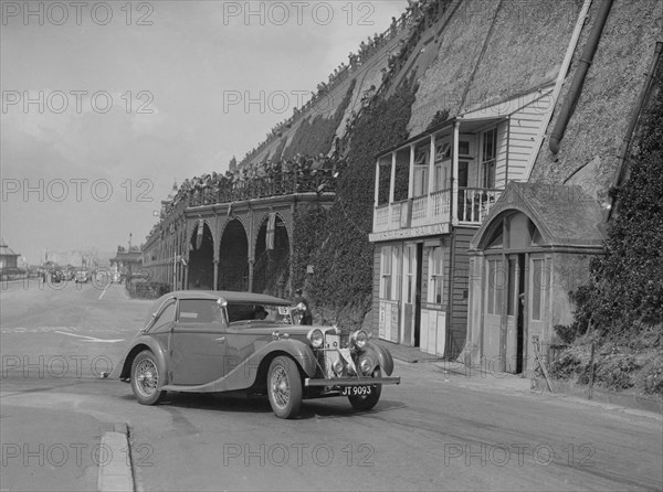 MG VA Tickford tourer of Lilian Roper competing in the RAC Rally, Madeira Drive, Brighton, 1939. Artist: Bill Brunell.