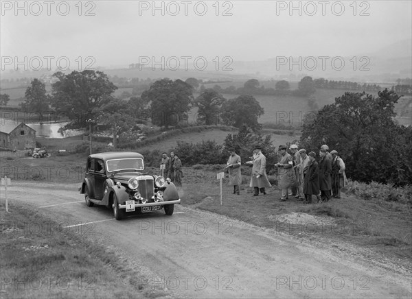 Daimler Light Straight 8 saloon of WH Smith competing in the South Wales Auto Club Welsh Rally, 1937 Artist: Bill Brunell.