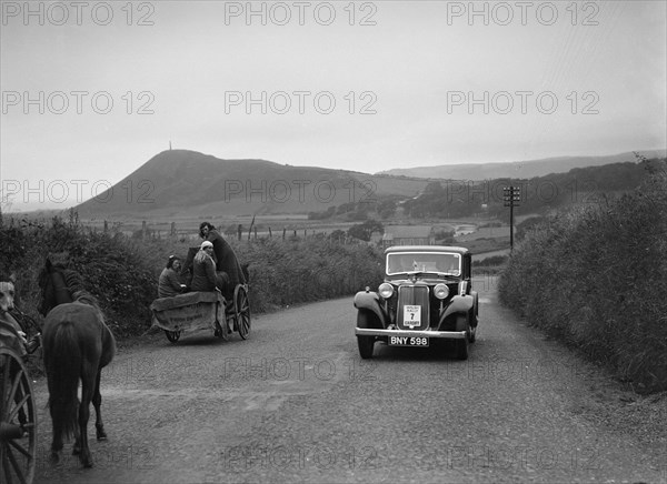 Armstrong-Siddeley saloon of FN Morgan competing in the South Wales Auto Club Welsh Rally, 1937 Artist: Bill Brunell.