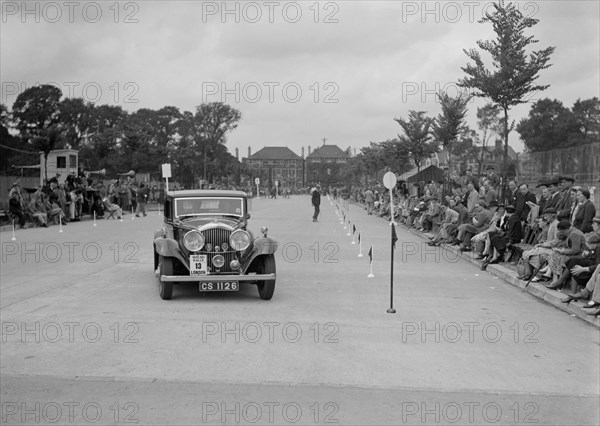 Bentley saloon of JP Agnew competing in the South Wales Auto Club Welsh Rally, 1937 Artist: Bill Brunell.