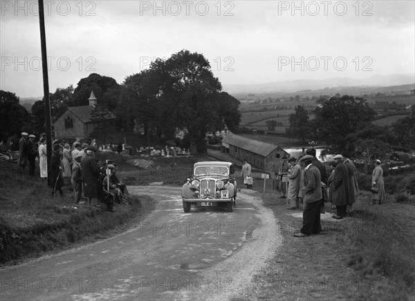 Rover saloon of CH Cooper competing in the South Wales Auto Club Welsh Rally, 1937 Artist: Bill Brunell.