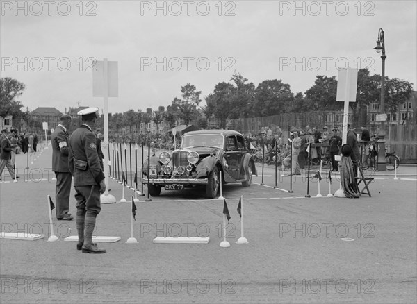 Jaguar SS saloon of DS Hand competing in the South Wales Auto Club Welsh Rally, 1937 Artist: Bill Brunell.