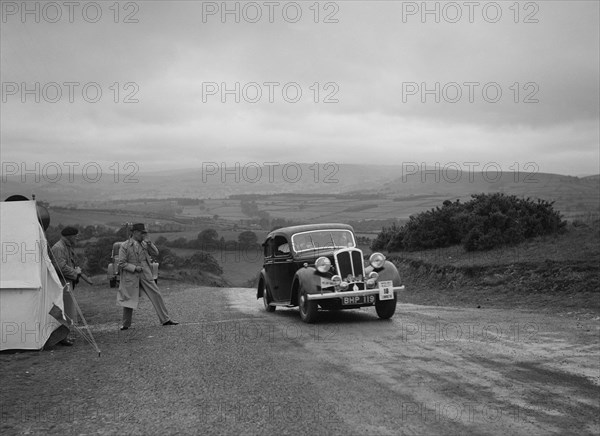 Standard saloon of Mrs SH Richards competing in the South Wales Auto Club Welsh Rally, 1937 Artist: Bill Brunell.