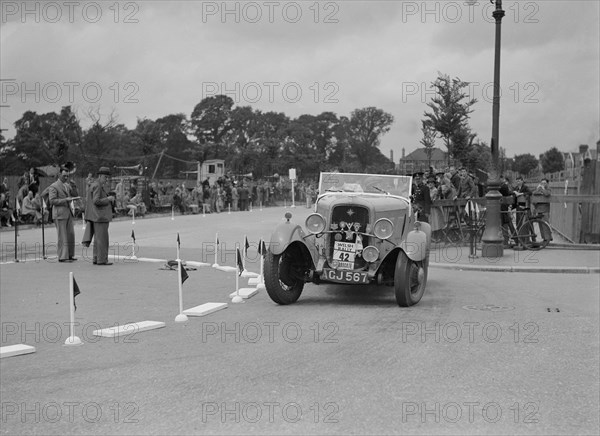 Ford V8 of TC Wise competing in the South Wales Auto Club Welsh Rally, 1937 Artist: Bill Brunell.