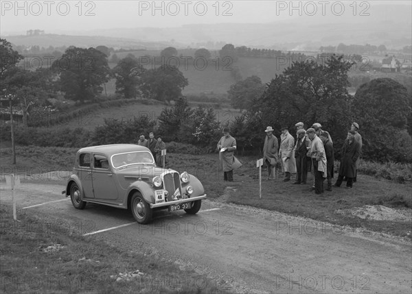 Rover saloon of WJH Davies competing in the South Wales Auto Club Welsh Rally, 1937 Artist: Bill Brunell.