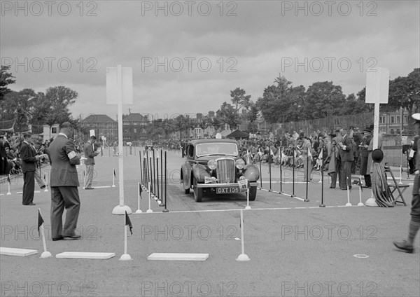 Jaguar SS saloon of HT Lewis competing in the South Wales Auto Club Welsh Rally, 1937 Artist: Bill Brunell.