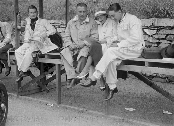 Cyril Paul (centre) and other drivers at the RAC TT Race, Ards Circuit, Belfast, 1932. Artist: Bill Brunell.