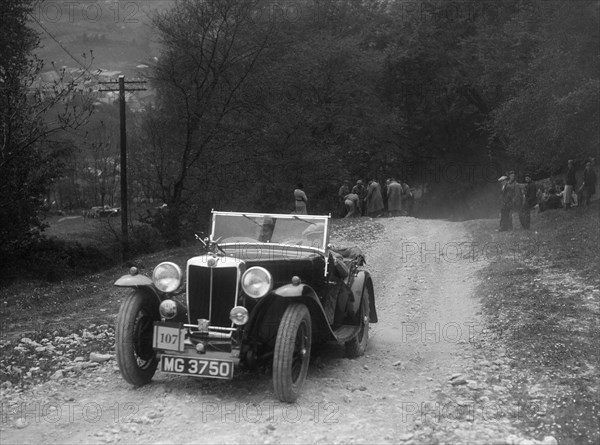 MG Magnette competing in a motoring trial, Nailsworth Ladder, Gloucestershire, 1930s.. Artist: Bill Brunell.