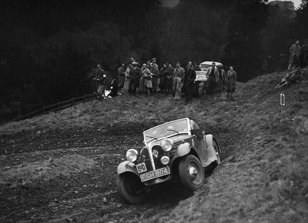 Frazer-Nash BMW 319/55 of KN Smith at the MCC Edinburgh Trial, Roxburghshire, Scotland, 1938. Artist: Bill Brunell.